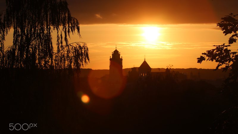 500px provided description: midsummer orange sunset in Vilnius, Lithuania [#sky ,#sunrise ,#city ,#sunset ,#tr