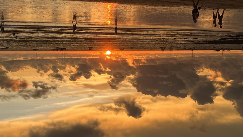 Sunset in Costa Rica with people on the beach